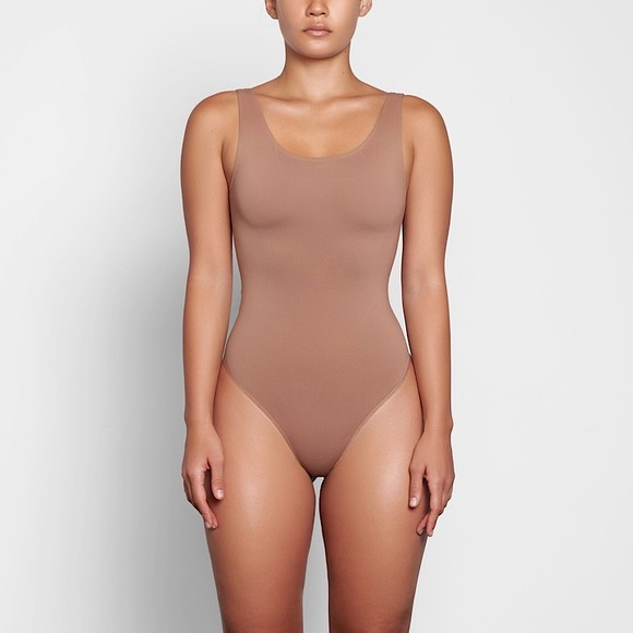 SKIMS Tops - Skims Smoothing Thong Bodysuit in Sienna